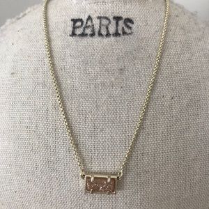 Kendra Scott necklace with blush sparkly stone